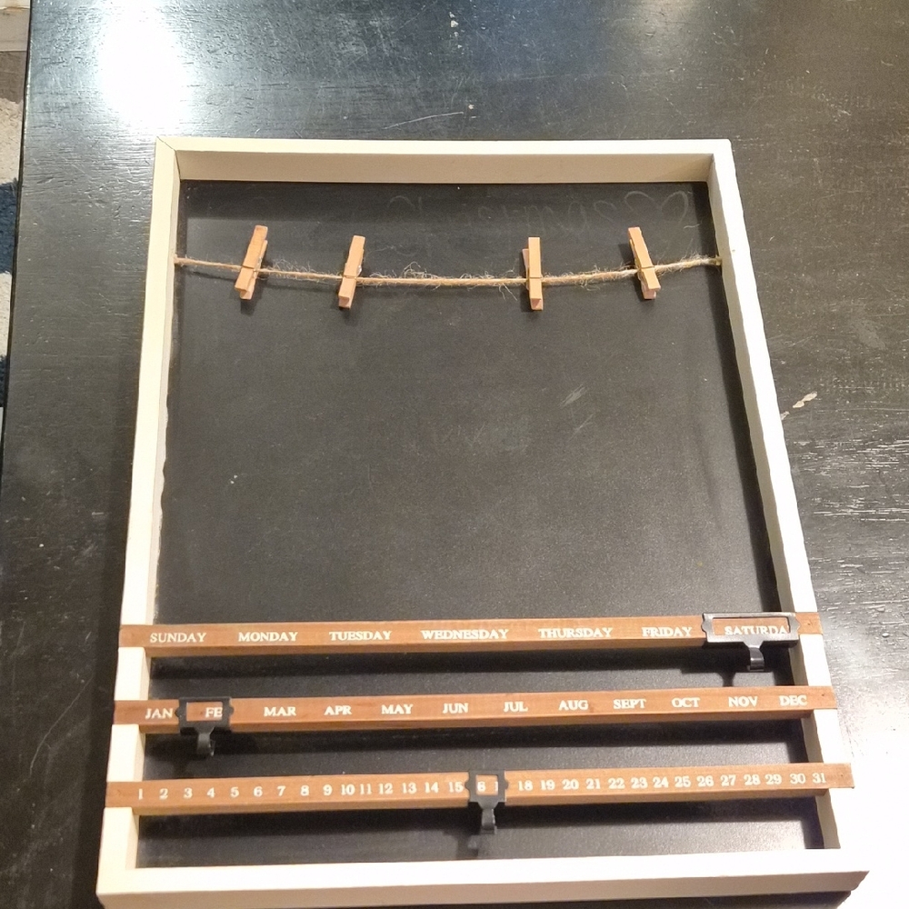 chalk board with clips and perpetual calandar